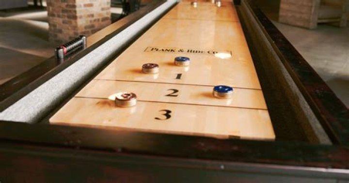 Can I put a shuffleboard table against a wall?
